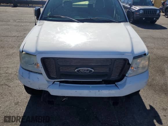 2005 Ford F-150 STX z VIN 1FTRX02W75KB65639, wystawiony jako Copart lot #82519815 z przebiegiem 151 351 mil mil oraz Szkoda całkowita • Salvage title. Historia ofert i sprzedaży dostępna na DreamBid. Obrazek 11.