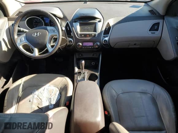 2012 Hyundai Tucson Limited z VIN KM8JUCAC9CU461659, wystawiony jako Copart lot #86997645 z przebiegiem 118 532 mil mil oraz Czysty tytuł • Clean title. Historia ofert i sprzedaży dostępna na DreamBid. Obrazek 8.