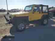 2000 Jeep Wrangler SE with VIN 1J4FA29P3YP705536, listed as a Copart auction lot 70344835 with 97,028 mi miles and Clean title. Bid and sale history available at DreamBid. Image 1.