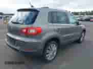 2011 Volkswagen Tiguan S with VIN WVGBV7AX1BW537860, listed as a IAAI auction lot 43047660 with 93,764 mi miles and . Bid and sale history available at DreamBid. Image 4.