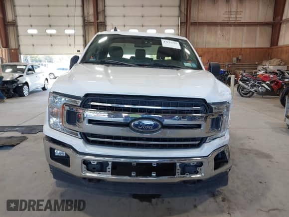 2019 Ford F-150 XL with VIN 1FTFX1E55KKC06597, listed as a IAAI auction lot 43227795 with 234,069 mi miles and . Bid and sale history available at DreamBid. Image 12.