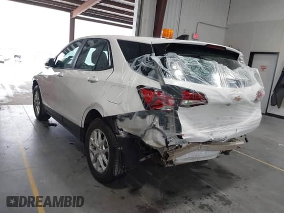 2024 Chevrolet Equinox LS z VIN 3GNAX5EG7RL282809, wystawiony jako IAAI lot #41303269 z przebiegiem 5 291 mil mil oraz . Historia ofert i sprzedaży dostępna na DreamBid. Obrazek 3.