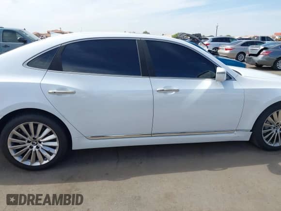 2014 Hyundai Equus Ultimate z VIN KMHGH4JH1EU083971, wystawiony jako IAAI lot #43242212 z przebiegiem 58 716 mil mil oraz . Historia ofert i sprzedaży dostępna na DreamBid. Obrazek 13.
