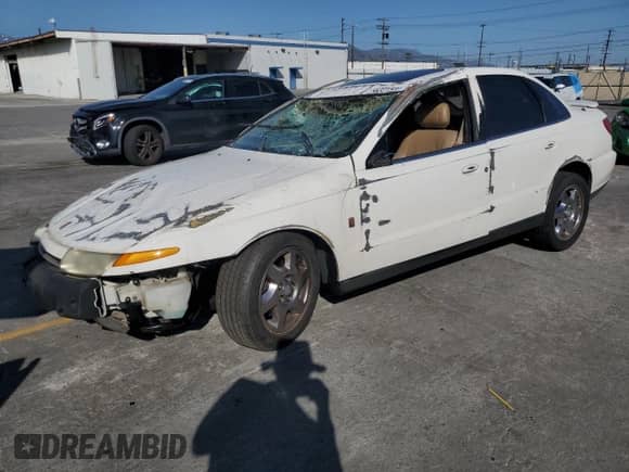 2002 Saturn LS with VIN 1G8JW54R52Y566288, listed as a Copart auction lot 56321595 with Not provided miles and Salvage title. Bid and sale history available at DreamBid. Image 1.