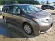 2017 Toyota Sienna XLE with VIN 5TDDZ3DC0HS168369, listed as a Copart auction lot 84734265 with 61,487 mi miles and Salvage title. Bid and sale history available at DreamBid. Image 4.