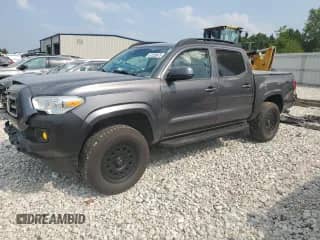 2021 Toyota Tacoma SR with VIN 5TFCZ5AN2MX257894, listed as a Copart auction lot 67529875 with 53,525 mi miles and Salvage title. Bid and sale history available at DreamBid. Image 1.