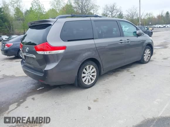 2012 Toyota Sienna XLE with VIN 5TDDK3DC2CS043855, listed as a IAAI auction lot 42189680 with 195,788 mi miles and . Bid and sale history available at DreamBid. Image 4.
