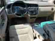 2004 Honda Odyssey EX с VIN 5FNRL18684B031145, выставлен на аукционе Copart как лот 80552985 с пробегом 137 777 миль миль и Списание • Salvage title. История ставок и продаж доступна на DreamBid. Изображение 8.