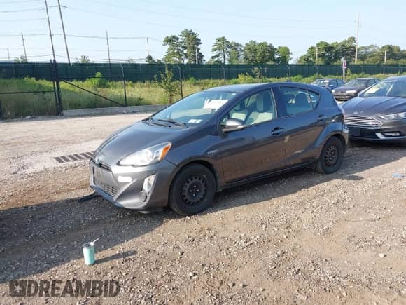 2015 Toyota Prius One z VIN JTDKDTB39F1096378, wystawiony jako IAAI lot #42947064 z przebiegiem 174 105 mil mil oraz . Historia ofert i sprzedaży dostępna na DreamBid. Obrazek 14.