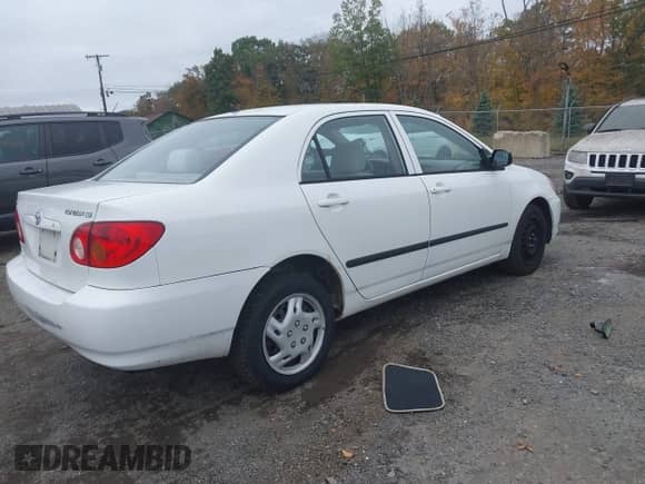 2004 Toyota Corolla CE z VIN 2T1BR32E54C234378, wystawiony jako IAAI lot #43453855 z przebiegiem 204 336 mil mil oraz . Historia ofert i sprzedaży dostępna na DreamBid. Obrazek 4.