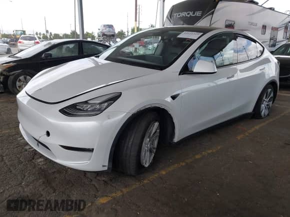 2022 Tesla Model Y Long Range z VIN 7SAYGDEE6NF345426, wystawiony jako IAAI lot #43121529 z przebiegiem 49 441 mil mil oraz . Historia ofert i sprzedaży dostępna na DreamBid. Obrazek 2.