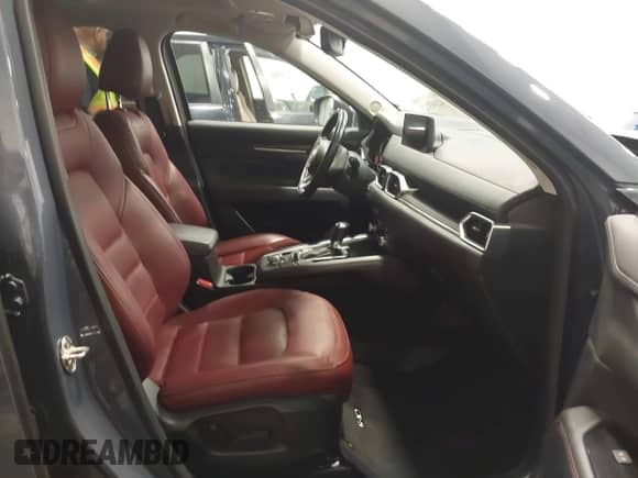 2022 Mazda CX-5 S Preferred z VIN JM3KFBCM0N1585446, wystawiony jako IAAI lot #42393723 z przebiegiem 70 131 mil mil oraz . Historia ofert i sprzedaży dostępna na DreamBid. Obrazek 5.