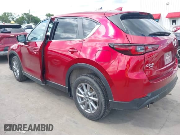 2023 Mazda CX-5 S Preferred z VIN JM3KFBCM8P0256180, wystawiony jako IAAI lot #42356779 z przebiegiem 50 994 mil mil oraz . Historia ofert i sprzedaży dostępna na DreamBid. Obrazek 3.