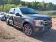 2018 Ford F-150 XL z VIN 1FTEW1EP2JFD32374, wystawiony jako IAAI lot #42993518 z przebiegiem 137 914 mil mil oraz . Historia ofert i sprzedaży dostępna na DreamBid. Obrazek 1.