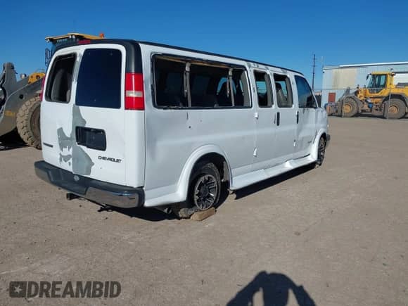2003 Chevrolet Express Passenger with VIN 1GAHG39U131229543, listed as a IAAI auction lot 41321783 with 165,221 mi miles and . Bid and sale history available at DreamBid. Image 4.