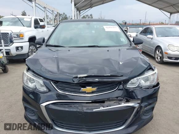 2017 Chevrolet Sonic LS z VIN 1G1JB5SH0H4144580, wystawiony jako IAAI lot #42421237 z przebiegiem 95 014 mil mil oraz . Historia ofert i sprzedaży dostępna na DreamBid. Obrazek 12.