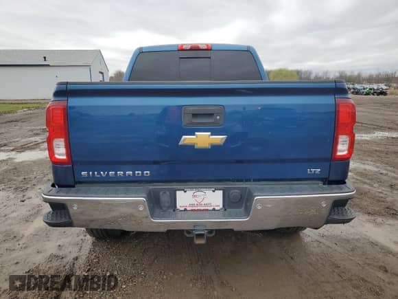 2018 Chevrolet Silverado 1500 LTZ z VIN 3GCUKSEJ2JG195475, wystawiony jako Copart lot #51098345 z przebiegiem 246 082 mil mil oraz Czysty tytuł • Clean title. Historia ofert i sprzedaży dostępna na DreamBid. Obrazek 6.