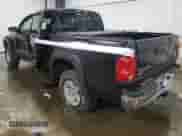 2006 Dodge Dakota SLT z VIN 1D7HW48K06S508602, wystawiony jako Copart lot #57176135 z przebiegiem 121 007 mil mil oraz Szkoda całkowita • Salvage title. Historia ofert i sprzedaży dostępna na DreamBid. Obrazek 2.