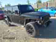 2022 Jeep Wrangler Unlimited Sahara Altitude with VIN 1C4HJXEG6NW238843, listed as a IAAI auction lot 43108547 with 15,051 mi miles and . Bid and sale history available at DreamBid. Image 1.