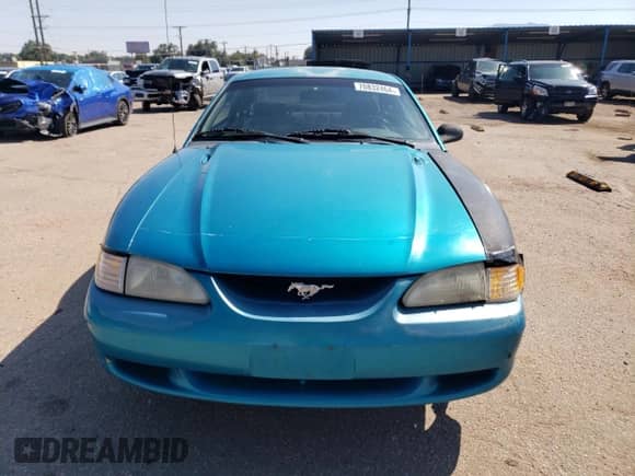 1994 Ford Mustang z VIN 1FALP4045RF130357, wystawiony jako Copart lot #70832464 z przebiegiem 112 148 mil mil oraz Szkoda całkowita • Salvage title. Historia ofert i sprzedaży dostępna na DreamBid. Obrazek 5.