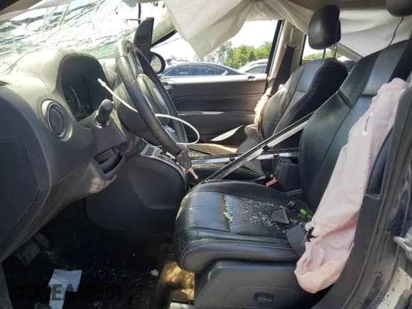 2015 Jeep Compass High Altitude with VIN 1C4NJDEB5FD324096, listed as a Copart auction lot 64557885 with 111,175 mi miles and Salvage title. Bid and sale history available at DreamBid. Image 7.