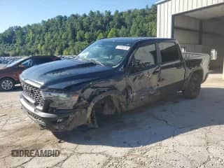 2025 Ram 1500 Rebel с VIN 1C6SRFLP5SN715296, выставлен на аукционе Copart как лот 70108725 с пробегом 5 901 миль миль и Списание • Salvage title. История ставок и продаж доступна на DreamBid. Изображение 1.