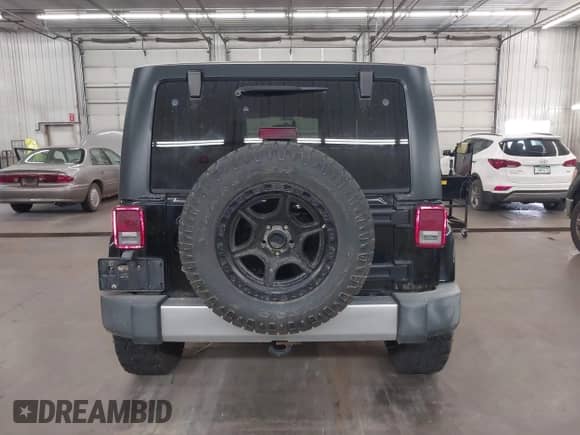 2008 Jeep Wrangler Sahara с VIN 1J4FA54148L505020, выставлен на аукционе IAAI как лот 43044141 с пробегом 185 600 миль миль и . История ставок и продаж доступна на DreamBid. Изображение 17.