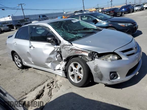 2011 Toyota Corolla S with VIN 2T1BU4EEXBC747199, listed as a Copart auction lot 87232925 with 127,495 mi miles and Salvage title. Bid and sale history available at DreamBid. Image 4.