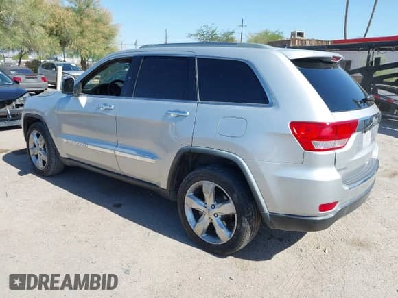 2012 Jeep Grand Cherokee Limited z VIN 1C4RJEBG9CC211082, wystawiony jako IAAI lot #42694437 z przebiegiem 149 205 mil mil oraz . Historia ofert i sprzedaży dostępna na DreamBid. Obrazek 3.