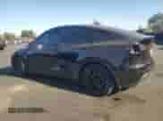 2021 Tesla Model Y Long Range with VIN 5YJYGDEE5MF214760, listed as a Copart auction lot 71198945 with 103,622 mi miles and Salvage title. Bid and sale history available at DreamBid. Image 2.