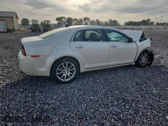 2012 Chevrolet Malibu LTZ z VIN 1G1ZG5E74CF284815, wystawiony jako Copart lot #81940285 z przebiegiem 119 577 mil mil oraz Szkoda całkowita • Salvage title. Historia ofert i sprzedaży dostępna na DreamBid. Obrazek 3.