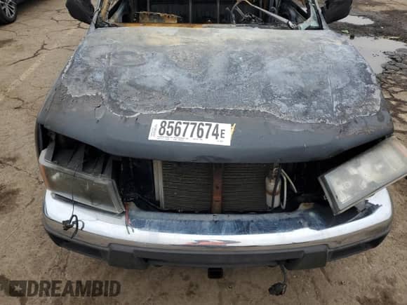 2005 Chevrolet Colorado LS Z71 z VIN 1GCDS196258106855, wystawiony jako Copart lot #85677674 z przebiegiem Nie podano mil oraz Czysty tytuł • Clean title. Historia ofert i sprzedaży dostępna na DreamBid. Obrazek 11.