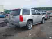 2011 Cadillac Escalade with VIN 1GYS3AEF9BR268475, listed as a IAAI auction lot 42611620 with 165,000 mi miles and . Bid and sale history available at DreamBid. Image 4.