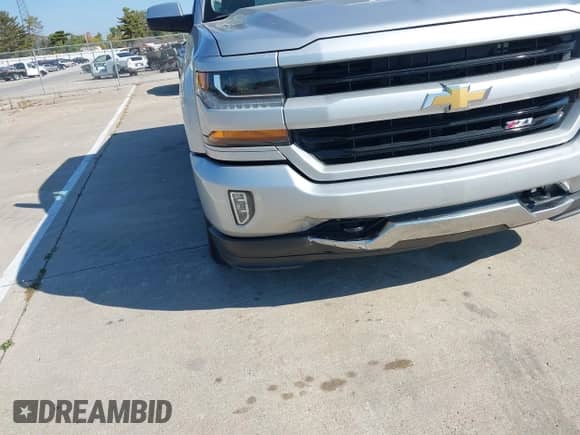 2018 Chevrolet Silverado 1500 LT with VIN 3GCUKREC4JG339988, listed as a IAAI auction lot 43222960 with 162,440 mi miles and . Bid and sale history available at DreamBid. Image 6.