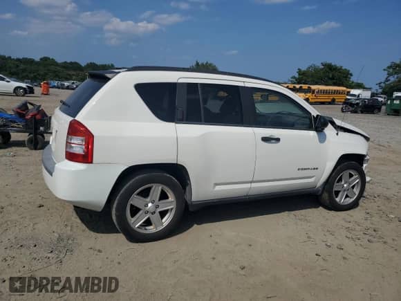 2007 Jeep Compass Sport with VIN 1J8FT47W27D119053, listed as a Copart auction lot 66326715 with 140,065 mi miles and Salvage title. Bid and sale history available at DreamBid. Image 3.