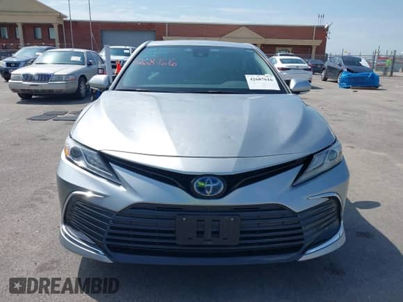 2021 Toyota Camry Hybrid XLE with VIN 4T1F31AK5MU565376, listed as a IAAI auction lot 42687616 with 57,880 mi miles and . Bid and sale history available at DreamBid. Image 12.