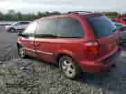 2006 Dodge Caravan SXT with VIN 1D4GP45R16B528574, listed as a Copart auction lot 83999665 with 125,386 mi miles and Salvage title. Bid and sale history available at DreamBid. Image 2.