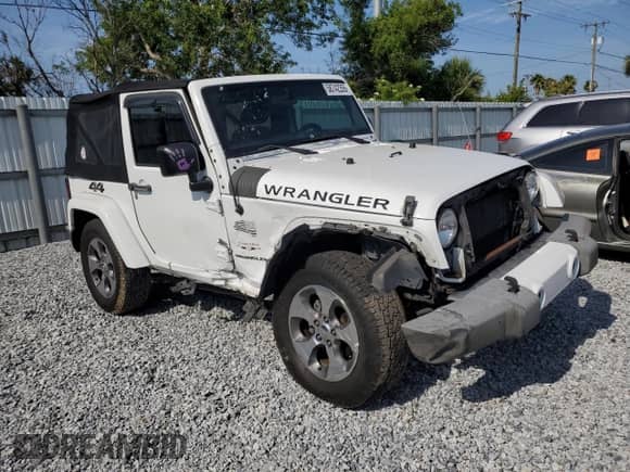2016 Jeep Wrangler Sahara with VIN 1C4AJWBG4GL234262, listed as a Copart auction lot 58742355 with 133,152 mi miles and Salvage title. Bid and sale history available at DreamBid. Image 4.