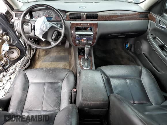 2013 Chevrolet Impala LTZ z VIN 2G1WC5E3XD1175652, wystawiony jako Copart lot #84699035 z przebiegiem 134 389 mil mil oraz Szkoda całkowita • Salvage title. Historia ofert i sprzedaży dostępna na DreamBid. Obrazek 8.