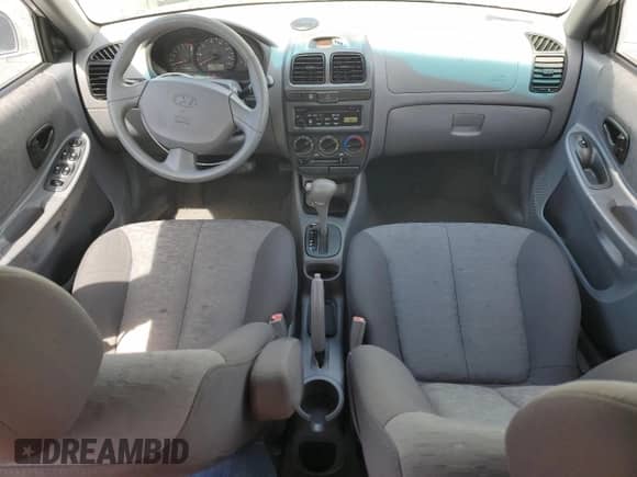 2005 Hyundai Accent GLS с VIN KMHCG45C65U576674, выставлен на аукционе Copart как лот 50726074 с пробегом 118 532 миль миль и На запчасти • Non repairable. История ставок и продаж доступна на DreamBid. Изображение 8.