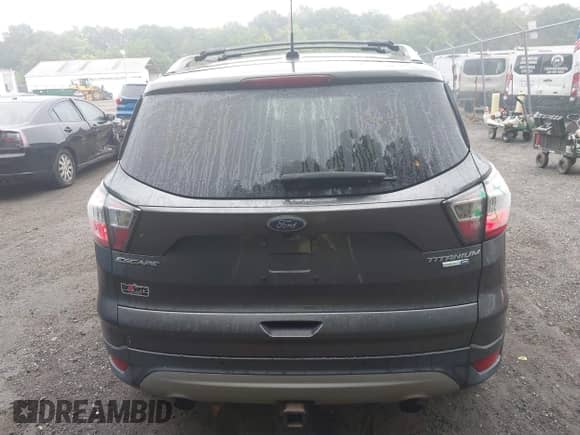2017 Ford Escape Titanium with VIN 1FMCU9J93HUA89369, listed as a IAAI auction lot 43234896 with 119,278 mi miles and . Bid and sale history available at DreamBid. Image 16.
