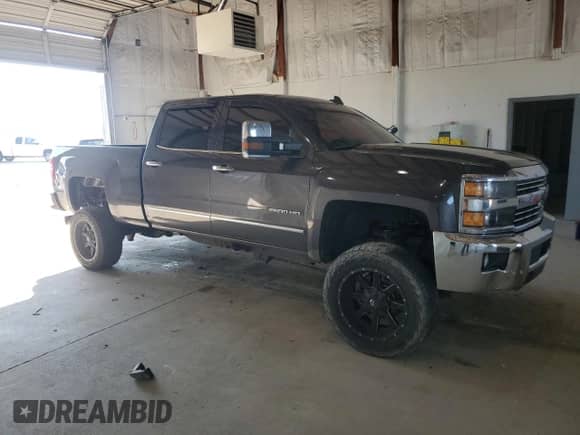 2015 Chevrolet Silverado 2500HD LTZ z VIN 1GC1KWE88FF631410, wystawiony jako Copart lot #65878395 z przebiegiem 118 963 mil mil oraz Szkoda całkowita • Salvage title. Historia ofert i sprzedaży dostępna na DreamBid. Obrazek 4.