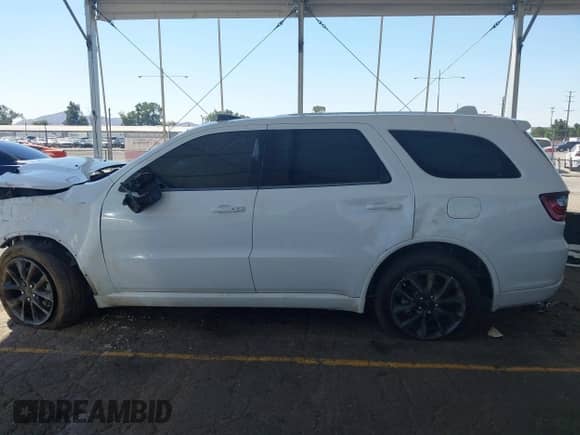 2018 Dodge Durango R/T with VIN 1C4SDHCT8JC269509, listed as a IAAI auction lot 43094809 with 56,323 mi miles and . Bid and sale history available at DreamBid. Image 15.