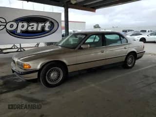 1998 BMW 7 Series 740iL with VIN WBAGJ832XWDM11394, listed as a Copart auction lot 54390685 with 126,828 mi miles and Clean title. Bid and sale history available at DreamBid. Image 1.