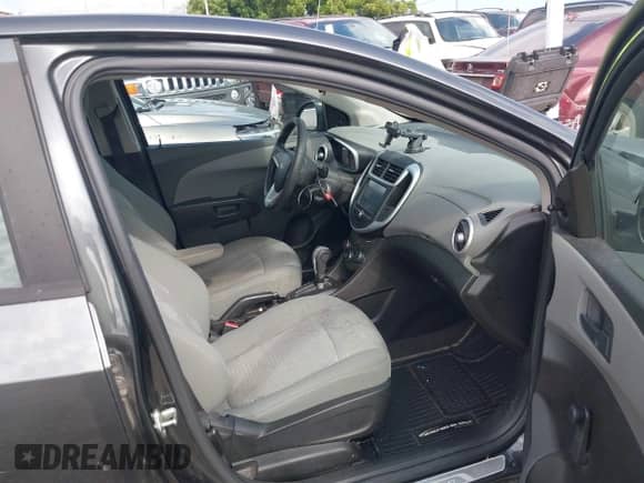 2017 Chevrolet Sonic LS with VIN 1G1JB5SH6H4159214, listed as a IAAI auction lot 42756264 with 171,152 mi miles and . Bid and sale history available at DreamBid. Image 5.