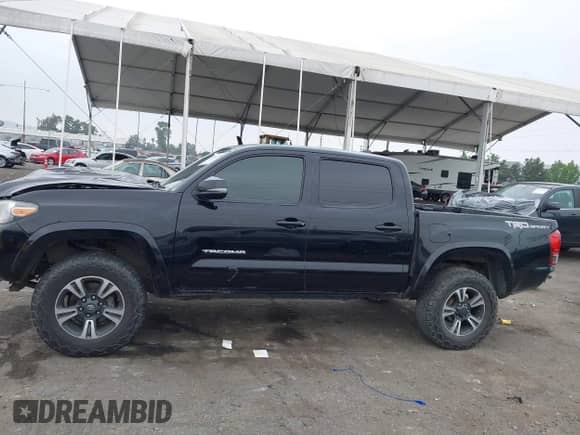 2017 Toyota Tacoma SR5 with VIN 3TMAZ5CN3HM026387, listed as a IAAI auction lot 42362780 with 216,739 mi miles and . Bid and sale history available at DreamBid. Image 14.