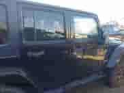 2007 Jeep Wrangler Unlimited Sahara z VIN 1J8GA59167L207644, wystawiony jako IAAI lot #43143110 z przebiegiem 92 971 mil mil oraz . Historia ofert i sprzedaży dostępna na DreamBid. Obrazek 13.