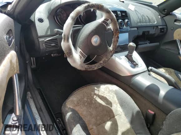 2007 Saturn Sky с VIN 1G8MB35B67Y129616, выставлен на аукционе Copart как лот 74225194 с пробегом Не указан миль и Списание • Salvage title. История ставок и продаж доступна на DreamBid. Изображение 8.