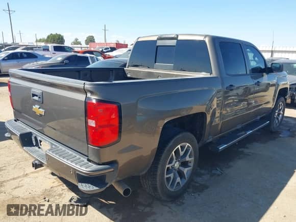 2014 Chevrolet Silverado 1500 LT with VIN 3GCUKREC0EG487593, listed as a IAAI auction lot 43311684 with 164,950 mi miles and . Bid and sale history available at DreamBid. Image 4.