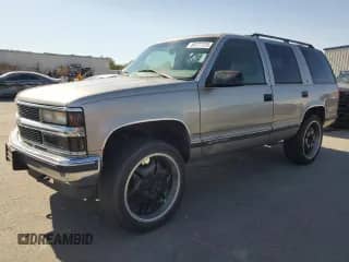 1999 Chevrolet Tahoe с VIN 1GNEK13R2XJ528764, выставлен на аукционе Copart как лот 68777125 с пробегом 146 601 миль миль и Списание • Salvage title. История ставок и продаж доступна на DreamBid. Изображение 1.
